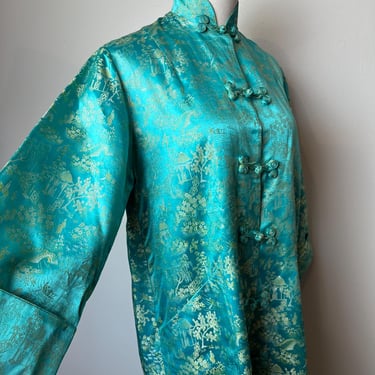 Vintage 1960’s  Chinese Robe/ jacket~ Teal blue color~ Shiny satin embroidery Rayon long coat frog closures Large cuffs ~ size SM 