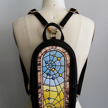 The Oblong Box Shop Spiderweb Stained Glass Window Backpack