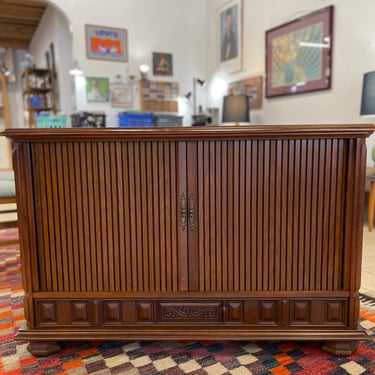 Mediterranean-Style Media Cabinet with Tambour Doors