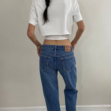 31 Vintage 80s Levi's 501 faded medium wash iconic red tab button fly LEVIS jeans made in USA size 31 x 29