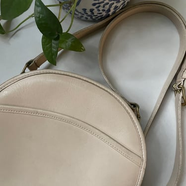 Round coach purse deals