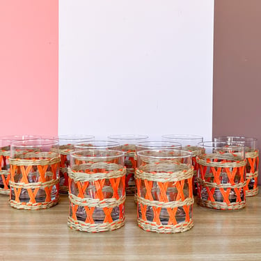 Set of Eleven Orange Raffia Glassware