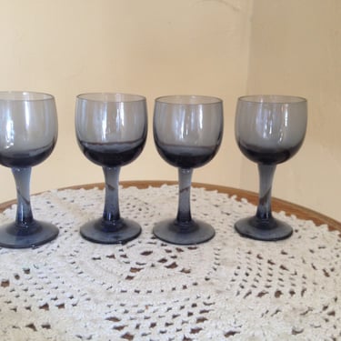 Wonderful vintage set of (4) Smokey Blue  Glass Pedestal Cordial or Shot Glasses- 3 1/2