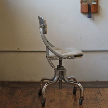 restored vintage industrial office chairs by DoMore company 