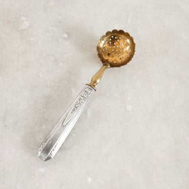 1930s French sterling silver and vermeil gold berry spoon