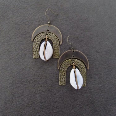 Large cowrie shell and hammered bronze earrings 