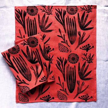 hand block printed linen napkins. sea things on melon pink. placemats / tea towels. boho beach house decor. coral. seashell. cactus print. 