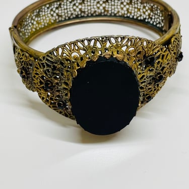 Gold Hinge Bracelet with a Black Glass Stone