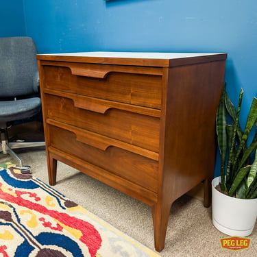 Mid-Century Modern walnut bachelor's chest with laminate top by Johnson Carper