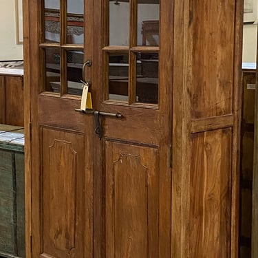 Vintage tall cabinet with glass doors by Terra Nova Furniture Los Angeles 