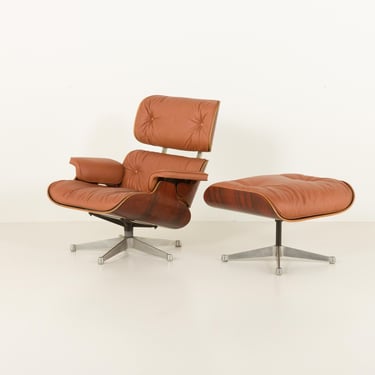 Charles and Ray Eames lounge chair with footstool in aniline leather for Herman Miller, 1970s 