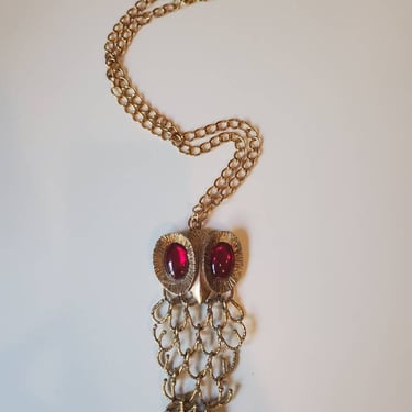 Vintage large owl necklace gold tone hinged with wide ruby eyes, 1970's 