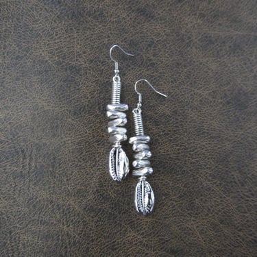 Modern silver cowrie shell earrings 