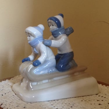Vintage Wonderful Children sledding figurine by  Paul Sebastion- Holiday Decor or Gift 