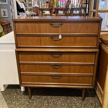 Mid century chest of drawers with loopy pulls. 40” x 19” x 45”