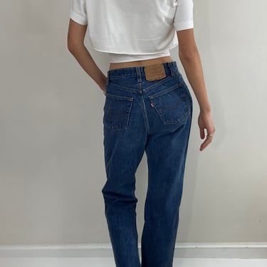 Vintage 80s Levi's 501 dark wash shrink to fit high waisted made for Women button fly Levis jeans size 27 x 32