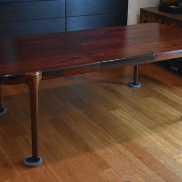 Newly-restored, extra-long Brazilian Rosewood extendable dining table - (extends 63