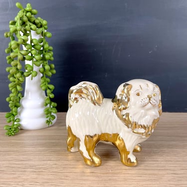 Pekinese ivory and gold porcelain figurine - vintage dog 