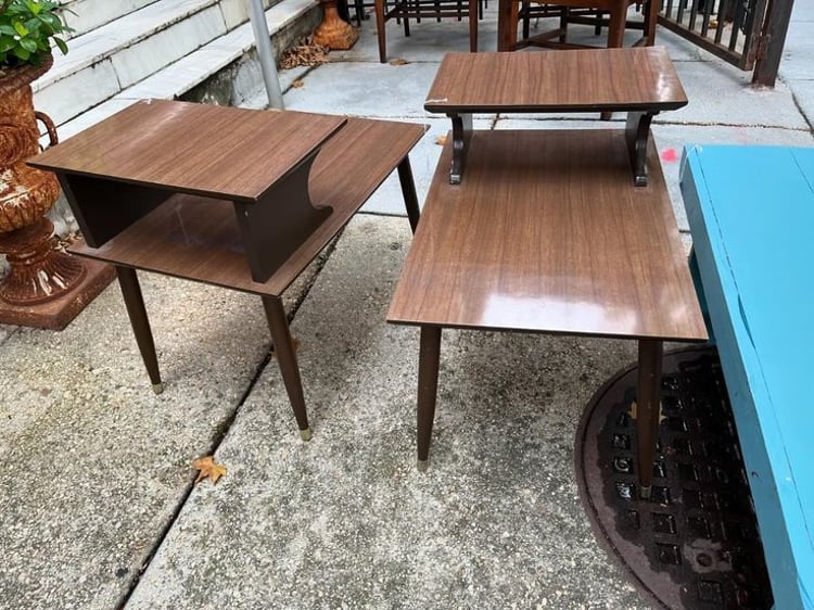 Mid century laminate step top side tables. Perfect for the living or bedroom! One available. 18” x 28” x 22” surfaces are 15” and 22”