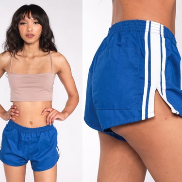 1980's Shorts (Kmart): 80s -Kmart- Unisex royal blue background polyester  totally 80s sport shorts with elastic waistband, no lining, no pockets and  white trim along the side seams and leg openings.