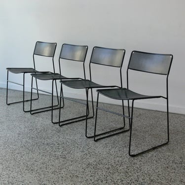 Modernist Perforated Metal Stacking Dining Chairs In the Manner of Niels Jorgen Haugesen (Set of 4) 