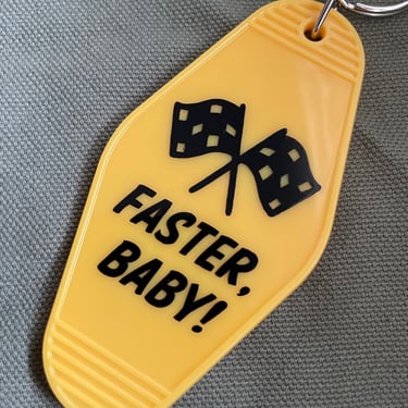 Faster, Baby! yellow & black checkered flag motel hotel vintage style acrylic keychain 