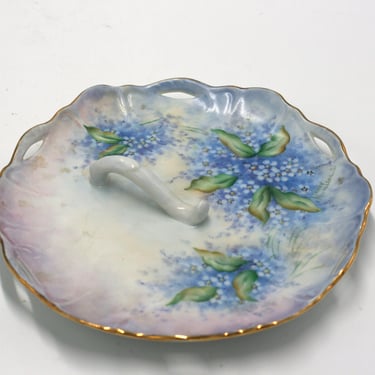 vintage nappy plate hand painted in blue floral 