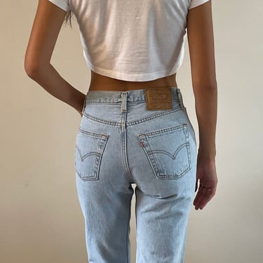 26 Levis 501 jeans / vintage high waisted faded light wash worn-in button fly boyfriend Levis 501 jeans made for women USA | small size 26 