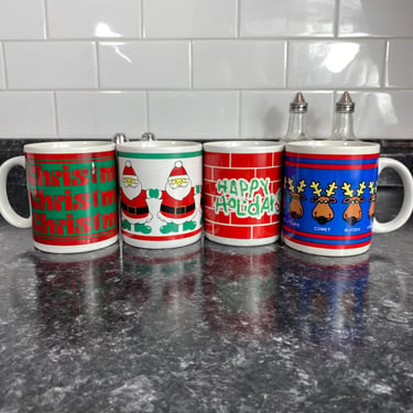 Vintage Houston Foods Christmas Mug Set of 4 | Christmas Cheer, Santa Clause, Happy Holidays & Santas Reindeer | Made in Korea 1986 Mugs 