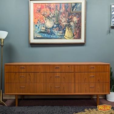 Danish Modern teak nine drawer dresser by Falster