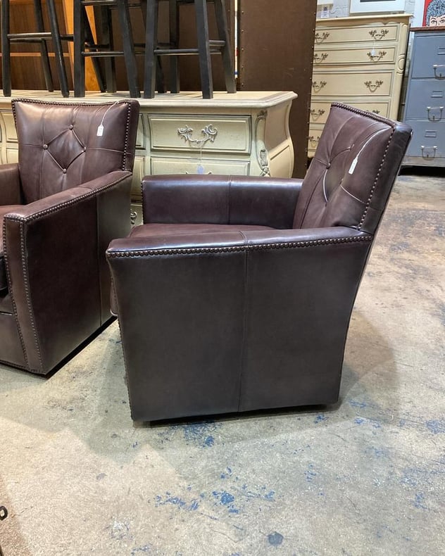 Brown leather swivel chairs 30” x 28” x 33” seat height 18”