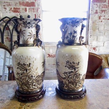 PAIR OF ASIAN VASES ON STANDS
