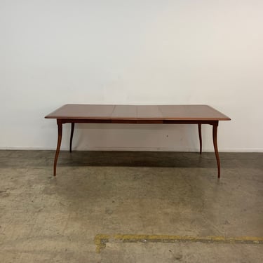 Mid century walnut dining table with sculptural legs 