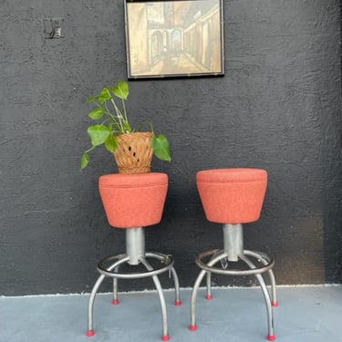 Pair of Steel and coral bar stools