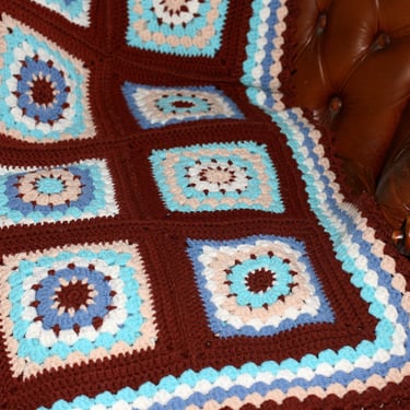 vintage granny square afghan in browns and blues 