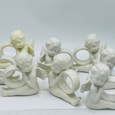 Vintage Set of  (8)  White Ceramic Angels-  Napkin Rings-Great Condition 