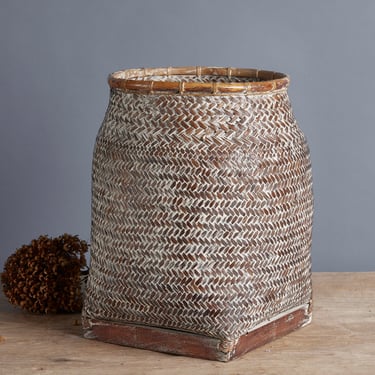 Woven Palm Gathering Basket with a Wooden Base and an Old White Wash from Borneo