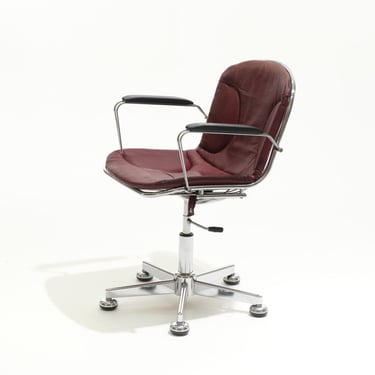 FAUTEUIL À ROULETTES EN CUIR ET MÉTAL, 1970s