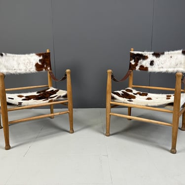 Pair of vintage cowhide safari armchairs, 1960s - mid century modern armchairs - pair of scandinavian armchairs - wooden armchairs 1960s 