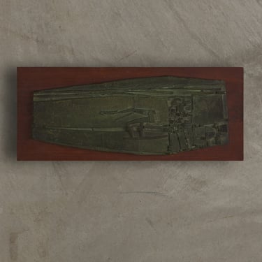 BRONZE RELIEF ON WOOD BASE SIGNED 'W BURRELL '68'