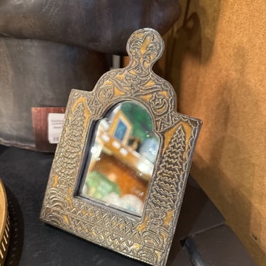 Stamped bronze mirror