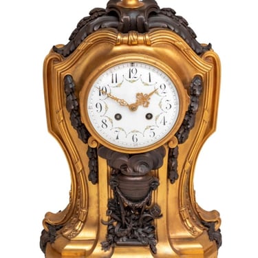 Louis XVI Style Gilt and Patinated Bronze Clock