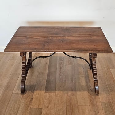 Antique Spanish Italian Baroque Style Walnut Trestle Table with Iron Stretcher Joined Ox Yoke Supports 