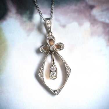 Antique Victorian .66 ctw. Diamond Bow Pendant Platinum 18K 