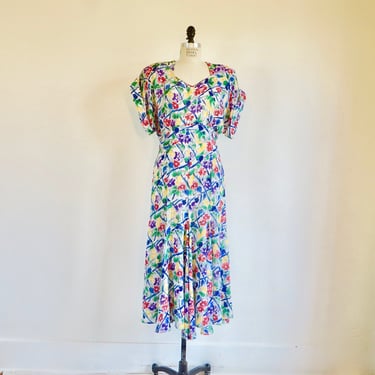 1980's does 1940's Norma Kamali Multicolor Floral Rayon Day Dress Sweetheart Neckline Midi Length Tie Back Short Sleeves 31