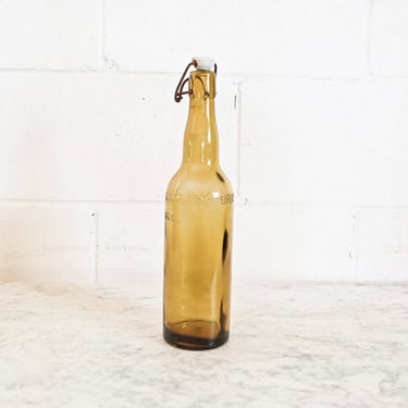 vintage french amber brasserie bottle with ceramic stopper