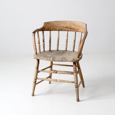 antique rustic captain's chair 