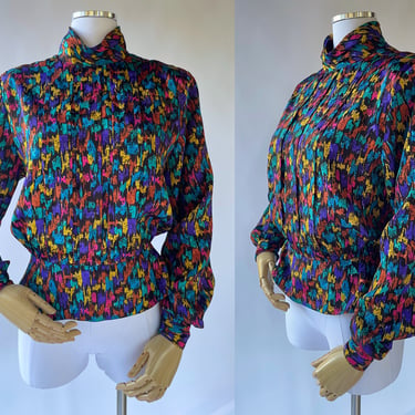 S/M 1980 - 1990's Peplum Blouse by 'Michelle Stuart' Abstract Multi Color Print / Polyester / Shoulder Pads / Shiny / High Neck / Boss Babe 