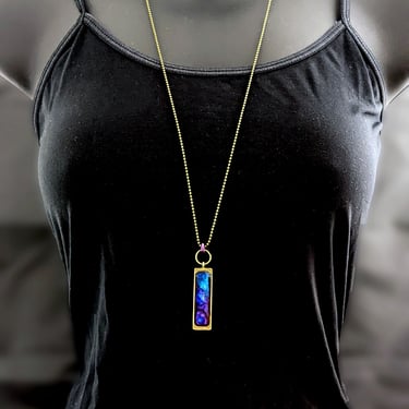Glowing Blue and Purple Pendant on Long Ball Chain