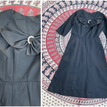 Vintage ‘50s classic black cocktail dress | silk faille, collar with crescent rhinestone detail, midi length, M/L 